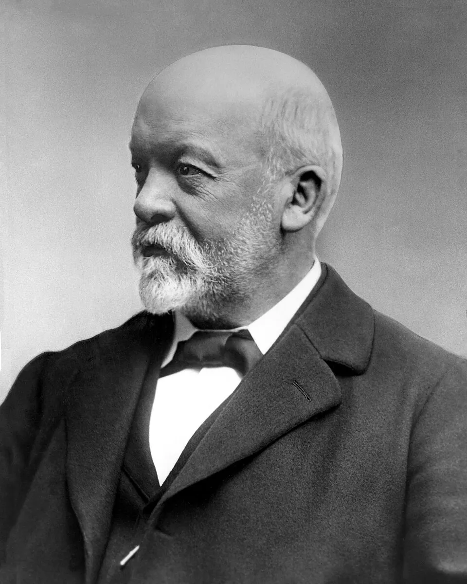 Portrait et histoire de Gottlieb Daimler, pionnier allemand de l'industrie automobile et des moteurs a combustion